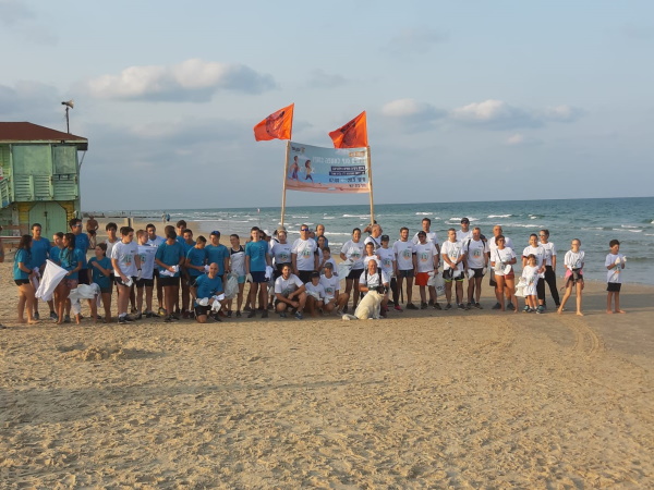 ריצת ניקוי בחוף בית ינאי של בכירי המועצה והקהילה